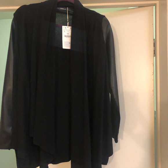 Zara Jackets & Blazers - NEVER WORN black sweater with faux leather sleeves Zara Jackets & Blazers - NEVER WORN black sweater with faux leather sleeves